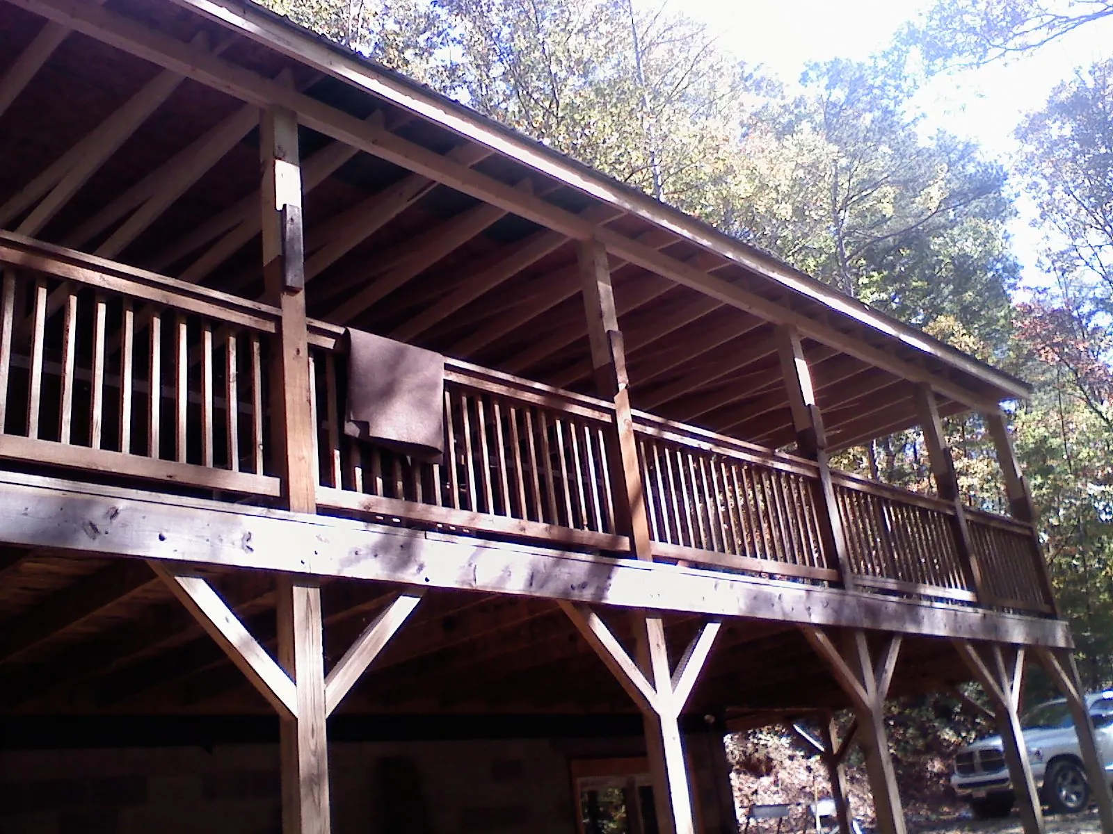 Timber framing under a new elevated porch and deck — Roof Leak Repair in Pearsall by Roofing Brothers